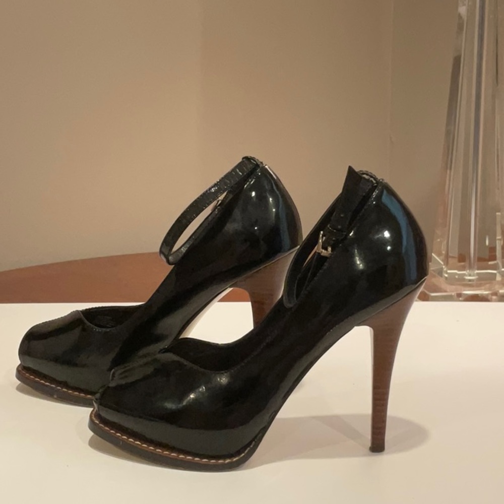 Black BCBGeneration peep toe stilettos